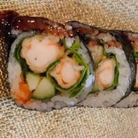 Shrimp Tempura Roll · Fried shrimp with cucumber, masago, spring mix, & eel sauce.