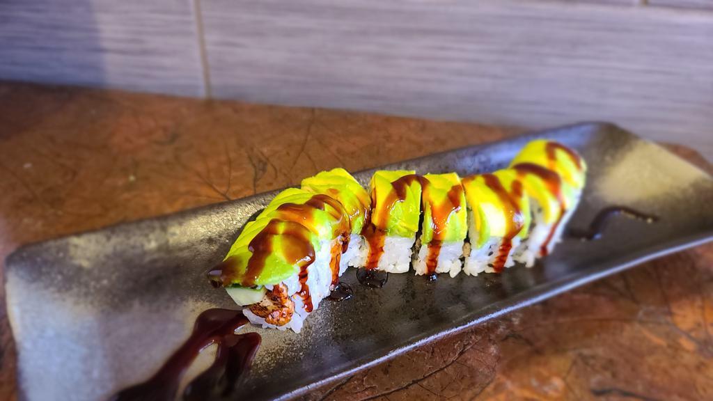 Dragon Roll · Eel & cucumber roll topped with avocado.
