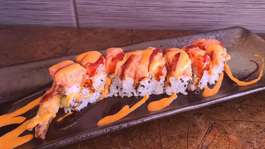 J Roll · Shrimp tempura and cucumber, topped with spicy tuna.