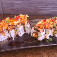 D’ Unknown Roll · Shrimp tempura and cucumber, topped with eel and lobster salad. Dressed with eel sauce and s...