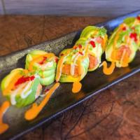 Stuffed Bamboo Roll · Spicy tuna and mango, wrapped in avocado topped with scallion, tobbiko – NO RICE.NO SEAWEED