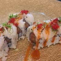 Dancing Roll · Salmon, tuna, topped with squid and torched with 7-spice; dressed with sriracha vinaigrette.