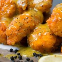 20 Boneless Wings · 20 crispy boneless authentic all white meat wings are hand breaded in our famous recipe and ...