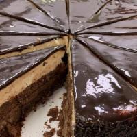 Chocolate Cake · Made with chocolate, kalamata extra virgin olive oil and hazelnuts drizzled with chocolate h...