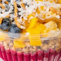 Floridian Pitaya Bowl · Pitaya Base, Granola, Banana, Mangoes, Blueberry, Peanut Butter ,Honey, Coconut Flakes