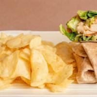 Chicken Caesar Wrap · Grilled or Crispy Chicken, crisp romaine, parm cheese and Caesar dressing in a honey wheat w...
