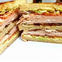 Turkey Club · Turkey breast, bacon, lettuce, tomato, mayo on white toast or wrap