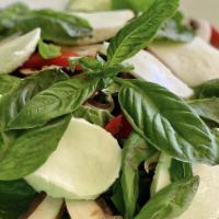 Summer Salad · Roasted peppers, fresh mozzarella, cherry tomatoes, cucumbers, fresh basil over fresh spinac...