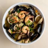 Fisherman'S Fra Diavolo · Mussels, shrimp, scallops and clams over a bed of linguine in choice of white garlic and oil...