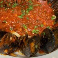 Mussels & Pasta · In a red or white sauce.
