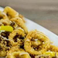 Neapolitan Calamari · Fried, tossed with olive oil, garlic, red crush pepper, banana pepper, topped with herb aioli.