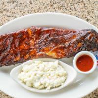 Ribs 1/2 Rack · Tender baby back ribs basted in our special sauce and cooked to perfection. Served with BBQ ...