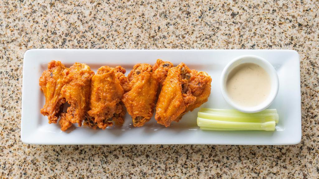 Buffalo Wings · Jumbo chicken wings tossed in our wing sauce. Served with celery sticks and gorgonzola sauce.
