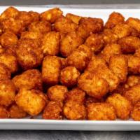 Large Tots · Fried grated potatoes.