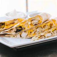 Blackened Chicken Quesadilla · Cheddar jack, caramelized onions, roasted peppers, corn, flour tortillas, w. sour cream and ...