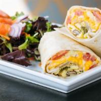 Veggie Breakfast Wrap · Scrambled eggs, cheddar jack, caramelized onions, roasted peppers, green peppers, chopped to...