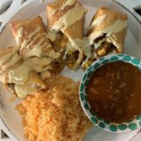 Chimichangas · 2-8 inch Deep fried ground beef, corn and cheese burrito (seasoned to perfection). . 