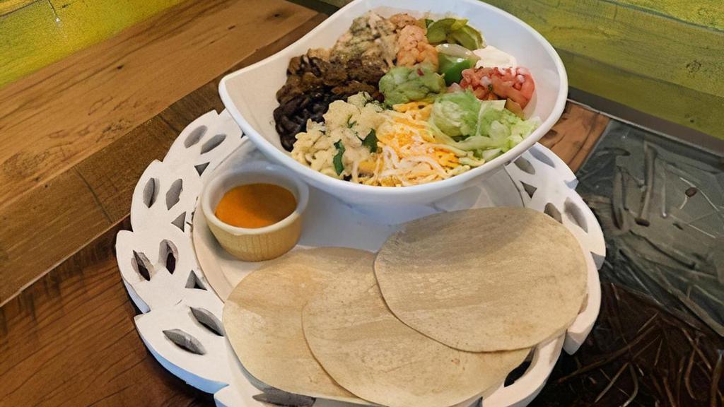 Fajita Bowl (Chicken+Steak+Shrimp) · Chicken + steak + shrimp + rice +beans +any hot toppings + any cold toppings. Served with 3 flour tortillas side.