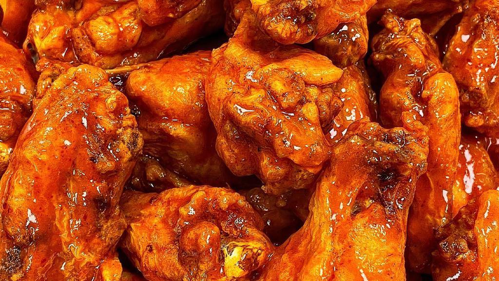 Wings · Deep fried wing dings tossed in your choice of sauce.