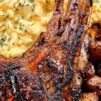 Lamb Chops · Grilled lollipop lamb chops with your choice of  (2) sides.