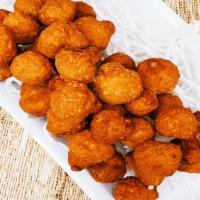 Fried Mushrooms · Light and crispy, deep fried to golden brown perfection.