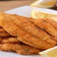 Catfish Only · Crispy fried catfish fillet. Served with choice of bread on the side. We fry in premium cano...