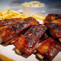 3 Bbq Ribs, 2 Whiting With 2 Sides · So juicy, succulent, finger-licking good pork ribs and fried whiting fillet combo. Served wi...