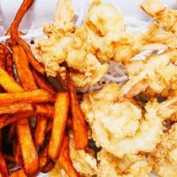 Fried Lightly Breaded Jumbo Shrimp With 2 Sides · Lightly breaded jumbo shrimp coated in seasoned breadcrumbs, then deep fried to golden brown...