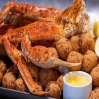 Snow Crab Legs With 2 Sides · Deliciously sweet and tender, our juicy Alaskan Snow Crab legs, served with two side dishes ...