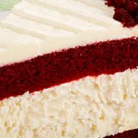 Red Velvet Cheesecake · A layer of red velvet cake with a layer of cheesecake, topped with cream cheese frosting.
