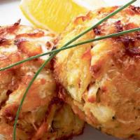 Maddman Crab Cakes · Delicate jumbo lump/lump crabmeat. Includes 2 sides, extra items for an additional charge.