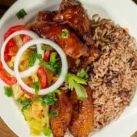 Jerk Bbq Wings · Served with rice & peas and veggies.