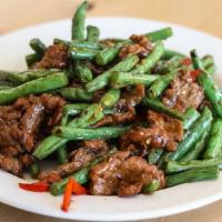 Sichuan “Dried Fried” Green Beans And Beef (G) · Beef, green beans, and spicy chili peppers