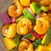 Mango Shrimp (G) · Shrimp with red and green peppers, onions, and fresh chopped mango