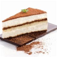 Tiramisu · Classic slice of tiramisu layered cake.