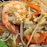 Thum Lao Salad · Shredded green papaya, noodles, shrimp,calamari,meatballs, vegetables,cherry tomatoes,GROUND...
