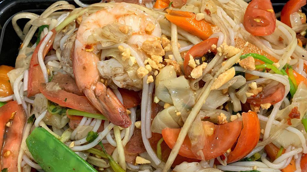 Thum Lao Salad · Shredded green papaya, noodles, shrimp,calamari,meatballs, vegetables,cherry tomatoes,GROUND PEANUTS,lime juice. Rice noodles or Vermicelli