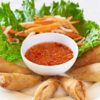 Crispy Spring Rolls (3) · A savory mixture of ground chicken, carrots, onions, rice vermicelli, and mushroom wrapped i...
