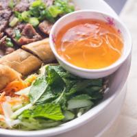 Grilled Meat & Crispy Rolls Vermicelli · A choice of grilled sliced pork or beef with crispy spring rolls on top of vermicelli. Comes...