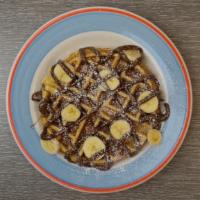 Buttermilk Waffles · Mixed fruit, a la mode or nutella & banana add for an additional charge.