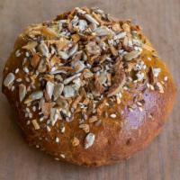 Everything Bagel (Gluten-Free) · Topped with poppy, sesame, sunflower seeds, and onion flakes.  Egg Free + Soy-Free + Nut Free.