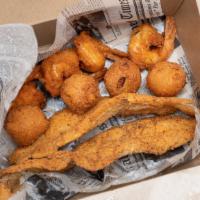 Seafood Combo · 2 piece fried fish (whiting), 4 shrimp, 4 hush puppies.