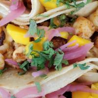 Shrimp Tacos · Grilled Mexican rub shrimp, chipotle aioli, mango, avocado and red pickled onions.