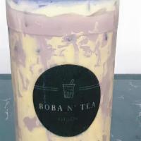 Taro Milk Tea With Boba · Taro Boba Milk Tea - Natural Taro mixed with milk served Hot or Cold topped with Whipped Cre...