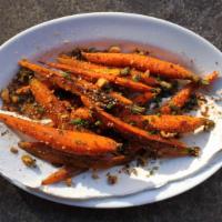 Roasted Carrots · Ricotta, honey, and mixed spiced nuts.