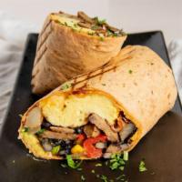 Breakfast Burrito · Chorizo, two eggs, grilled peppers and onions, black beans, potatoes, avocado, sour cream, p...