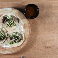 Taco Carne Asada · |Gluten Free, Dairy Free, Nut Free| served on three house-made corn tortillas, grilled woods...