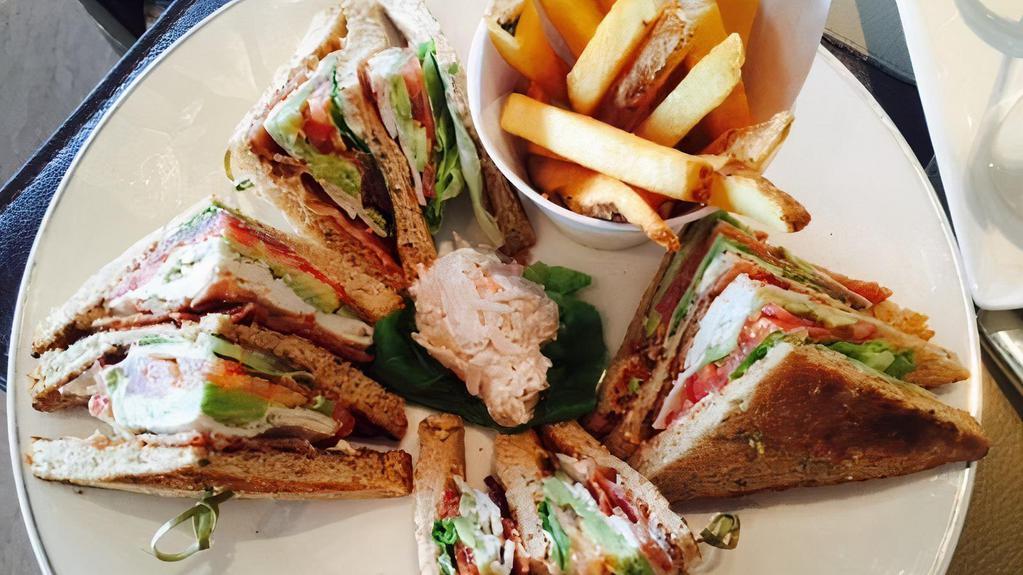 Turkey Deluxe Club Sandwich · Turkey, lettuce, tomatoes, mayo, bacon & pickles