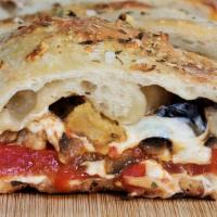 Veggie Stromboli · Sauce, cheese, mushrooms, onions, green peppers, broccoli, spinach, olives & tomatoes