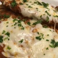 Chicken Cutlet Parm Side · Tomato sauce, provolone and romano cheese.

Consumer advisory warning for raw foods.